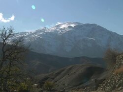 WS View of clouds rolling over peak of atlas mountains / Marrakech, Tensift, Morocco  Stock Footage