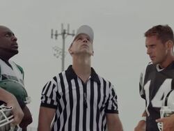 CU, American football referee tossing coin in field, Staten Island, New York, USA Stock Footage