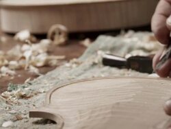 Violin Maker carving Stock Footage