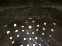 W/S dolly track dome and cellar windows, rays of light, ancient islamic architecture Stock Footage