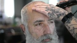 brutal barber clipper mows bearded adult senior hipster Stock Footage
