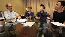 Startup Asian Business Entrepreneurs With Mentor in Meeting Stock Footage