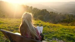Reading in natural paradise Stock Footage