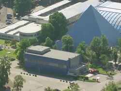 MS AERIAL Shot over pyramid shape structure / Prague, Czech Republic Stock Footage