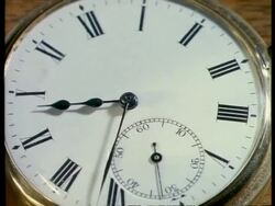 T/L BCU gold Half Hunter pocket watch, white watch face, black roman numerals Stock Footage