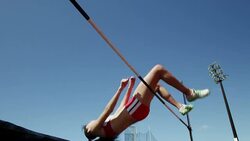 Female high jumper knocking off bar Stock Footage