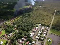 AERIAL: Homes In Pahoa, Hawaii Threatened By Lava Flow From Kilauea Volcano Stock Footage