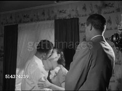 1952: LAS VEGAS, NEVADA: QUICK MARRIAGE: Justice of the Peace Jimmy Down performing brief ceremony for 'Dottie' & 'Gordon Wilson', kissing, Jimmy wishing them well. Married, fast, cheap, inexpensive, Iconic. Instructional Video