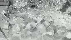 1951 MONTAGE Workers breaking an optical glass mold then sorting through the pieces / United Kingdom Stock Footage