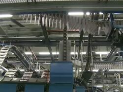 MS Shot of conveyor belts in newspaper print office / Trier, Rhineland-Palatinate, Germany Stock Footage
