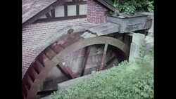 MS Water splashing on mill water wheel / United States Stock Footage