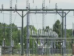 WS View of Heat waves waft pass power station with electrical grid, transformers and more / Beaverton, Oregon, United States  Stock Footage