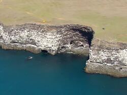MS AERIAL ZO View of open land and lighthouse at Reykjanes Peninsula / Iceland Stock Footage