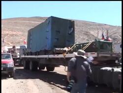 Rescuers achieve a key breakthrough in efforts to rescue 33 trapped miners, reaching the caverns where they are imprisoned with a bore hole that will now be widened so that they can be pulled to freedom. News Clip