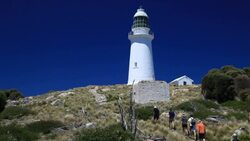 Walking up to lighthouse Stock Footage
