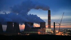 Ratcliffe on Soar power station in Nottinghamshire, UK, a massive cola fired power station which is contributing huge quantities of C02 to the atmosphere and driving climate change. Stock Footage