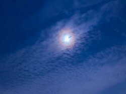 Corona with clouds at night Stock Footage