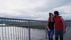 Physically Fit Caucasian Couple in their Thirties Walking and Kissing Stock Footage