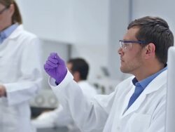 MS Scientist Working In The Laboratory Stock Footage