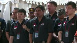 CLEAN : International forensic teams help to identify AirAsia victims News Clip