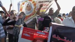 FAMILIES OF PEOPLE KILLED DURING UPRISING ARRIVE FOR MUBARAK TRIAL News Clip
