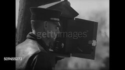 1936: DRAMATIZATION: Fireman standing by firebox. Fire Chief telling him (SOT) 'it's a touch off, send for the Arson Squad.' Instructional Video