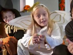 HD DOLLY: Kids Holding Out Their Halloween Candy Stock Footage