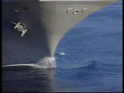 USS Vinson and USS Sacramento resupply at sea. News Clip