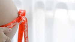 Pregnant woman relaxing in the living room. Stock Footage