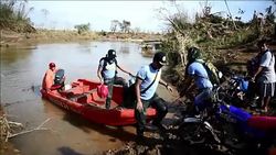 CLEAN : Typhoon survivors wait for aid in the Philippines News Clip