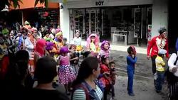 VOICED : Payasos guatemaltecos salen a las calles a celebrar su dia News Clip