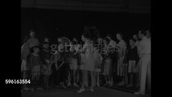 Suzanne Lenglen gives group tennis lesson to young people in Paris News Clip