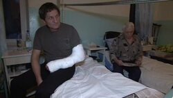 CLEAN : Ukraine civilians injured when rocket hits bus being treated News Clip