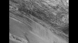 Large salt cutter machine extracting salt from mine in Nova Scotia for war effort during World War II News Clip