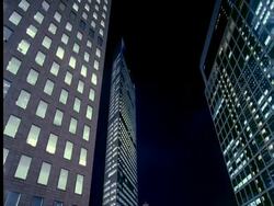 WA view looking up at modern Shiodome buildings at night, Tokyo, Japan Stock Footage