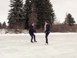 Young adult couple skating together. Stock Footage