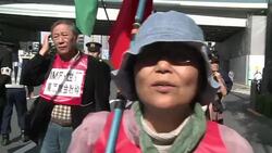 CLEAN : Anti IMF activists stage rally in Tokyo News Clip