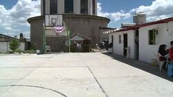 CLEAN : On cargo trains migrants cling fast to dream of travelling north News Clip