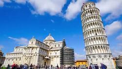 4K TIME-LAPSE PISA, ITALY - CIRCA MARCH 2015: The basilica, baptistery and the Leaning Tower of Pisa, Tourists are walking on the street in day light Stock Footage