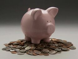 MS, ZI, Studio shot of pink piggy bank pile of coins Stock Footage