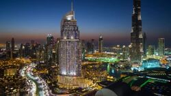 United Arab Emirates, Dubai, the Burj Khalifa, elevated view looking over the Dubai Mall - time lapse Stock Footage