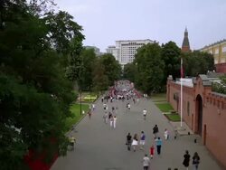 Time lapse Tourists by the red wall inside the Kremlin Stock Footage