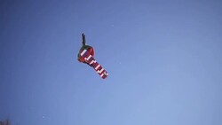 Snowboarder performing a trick in a snow park Stock Footage
