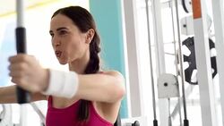 beautiful young woman doing a beautiful figure in the gym Stock Footage