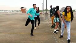 MS TS ZI Group of friends dancing on rooftop of parking garage Stock Footage