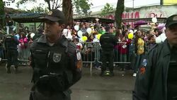 VOICED : Favela acoge al papa de los pobres News Clip