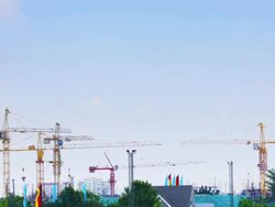 Construction site with cloudscape near habitat Stock Footage