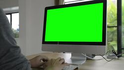 Using computer with green screen (HD) Stock Footage