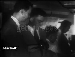 1952: ROUTE CONTROL CENTER: Correspondent David Brinkley in radar room at Washington National Airport w/ CAA radar expert James Richey, SOT explaining what happened Saturday night, UFO sighting, light no aircraft, TD MS Radar screen. Instructional Video