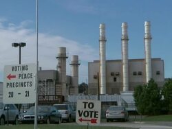 November 2, 2010 TD A Voter walks past American flag after casting vote in midterm election / Dearborn, Michigan, United States Stock Footage